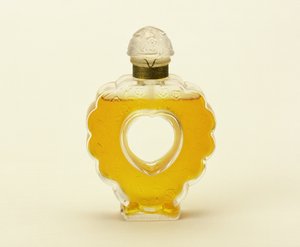 Coeur Joie, heldere matglazen parfumfles door Lalique voor Nina Ricci